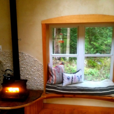 Wood stove and window seat. Booya!